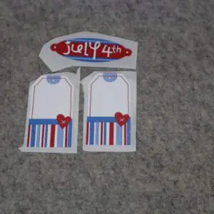 Red, white, and blue decorative gift tags.