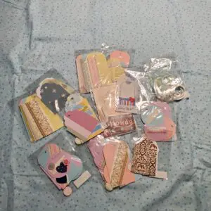 Colorful decorative tags arranged on a blue background.