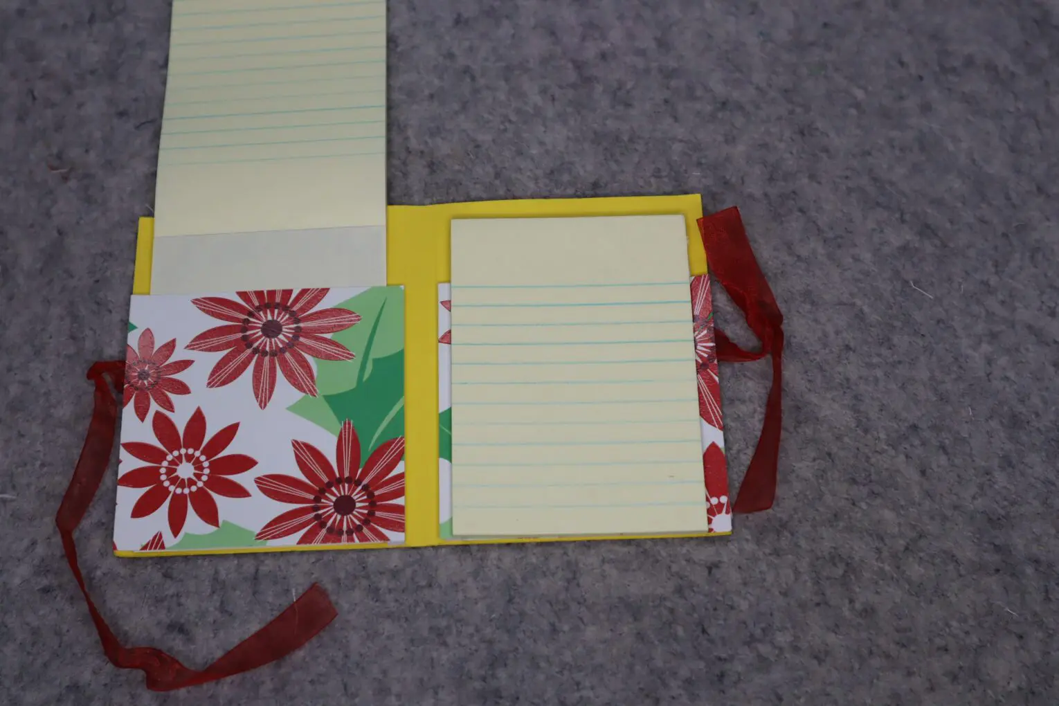 Stylish notepad featuring a ribbon closure