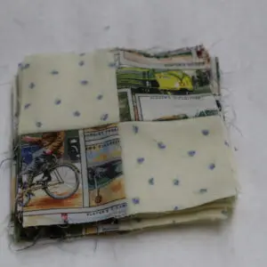 A folded piece of fabric with various prints and patterns.
