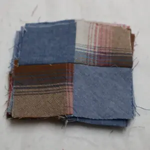 Small patchwork fabric piece with four different textile squares.