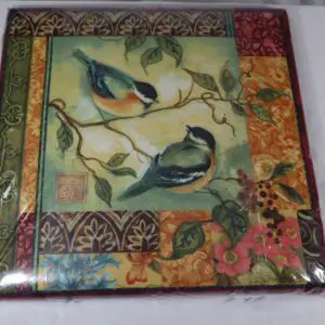 Decorative box with colorful bird artwork on the lid.