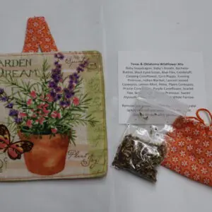 A floral-themed tea bag and herbs with a decorative card and note.