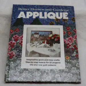A book titled 'Street Homes and Gardens Applique' with a floral cover design.