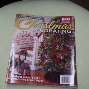 A Christmas decorating magazine featuring a festive tree and holiday crafts.