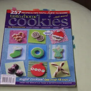 A magazine cover featuring decorative cookies with colorful icing and designs.