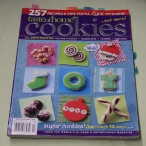 A magazine cover featuring decorative cookies with colorful icing and designs.