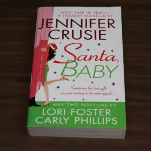 Book titled 'Santa Baby' by Jennifer Crusie with Lori Foster and Carly Phillips.