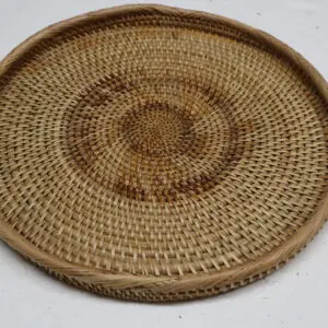Round woven basket tray with natural and brown patterns.