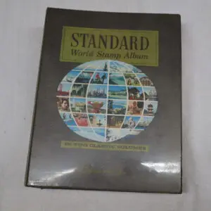 A boxed set of Standard World Postage Stamps from 1840-1990.