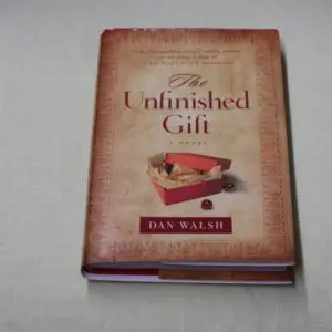Book titled 'The Unfinished Gift' by Dan Walsh with a vintage cover.