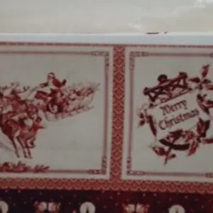 Vintage Christmas cards with festive red designs.