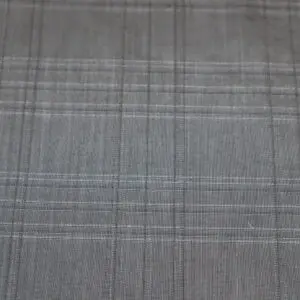 Close-up of gray plaid fabric with intersecting lines.