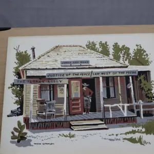 A rustic storefront with a porch and wooden details.