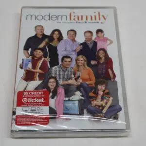 DVD cover of Modern Family TV show with cast photo.