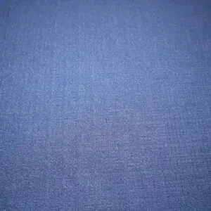 Close-up of blue denim fabric texture.