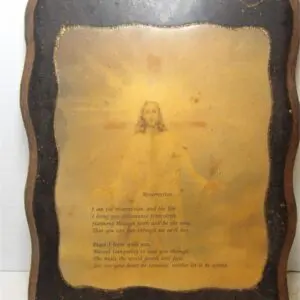 Framed religious artwork featuring Jesus with a prayer text.
