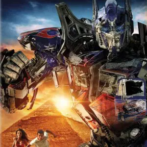 A giant robot with glowing eyes and clenched fist stands behind two people at sunset.