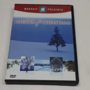 DVD cover of "Carol of Christmas" with winter scenes and a tree.