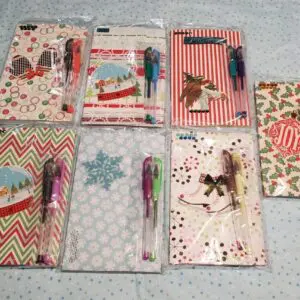 Colorful stationery sets with decorative winter themes.