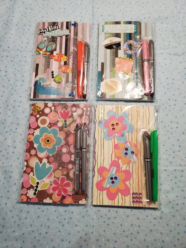 Colorful stationery sets with decorative designs.
