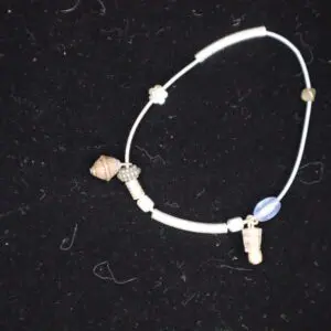 Beaded necklace with unique natural elements.