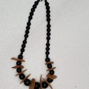 Black and brown beaded necklace with unique accents.