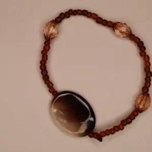 Stylish beaded bracelet in brown and rose