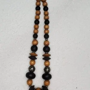 Stylish beaded necklace with wood and metal accents.