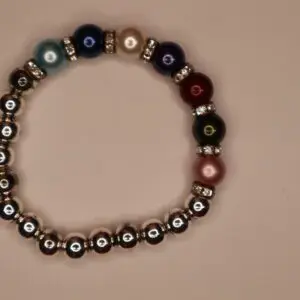 Colorful beaded bracelet with silver accents.