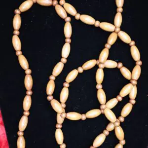 Natural wooden bead necklace with elegant design.