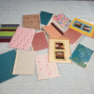 Assorted colorful notecards on a blue background.