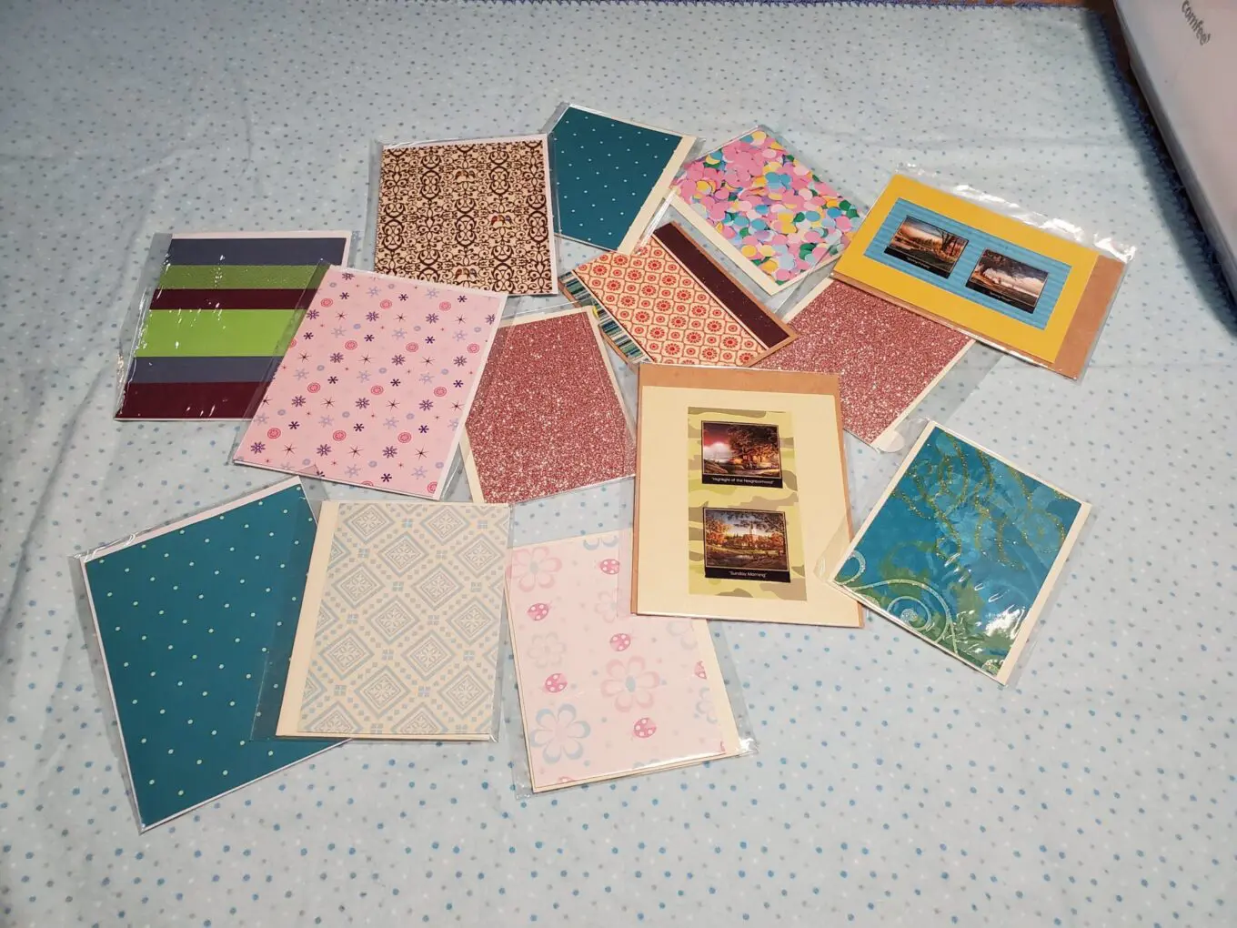 Assorted colorful notecards on a blue background.