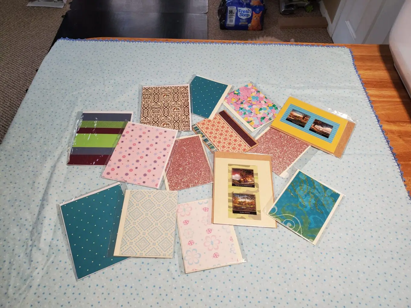Colorful notepads arranged on a blue background.