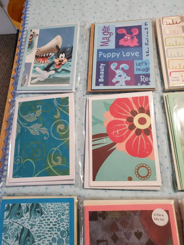Colorful greeting cards with playful designs displayed.