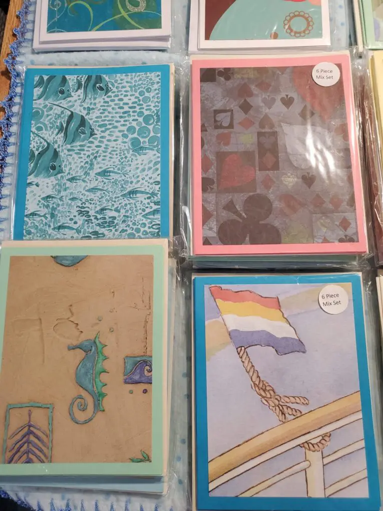 Assorted greeting cards with colorful designs.