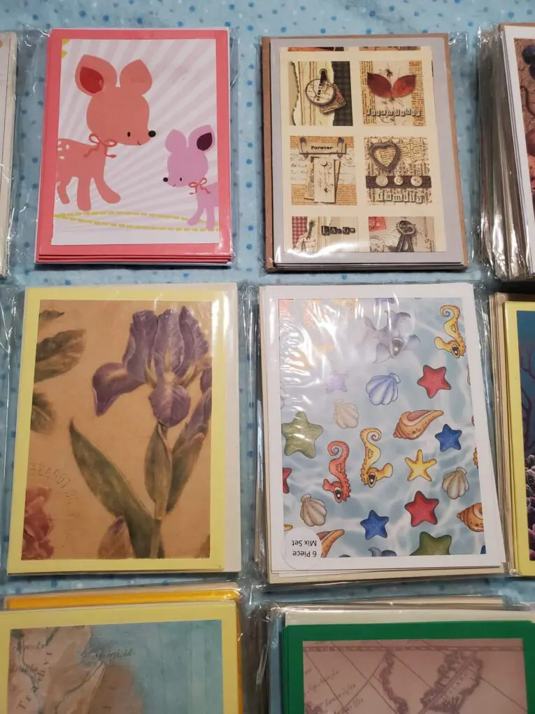 Assorted decorative cards with whimsical designs.