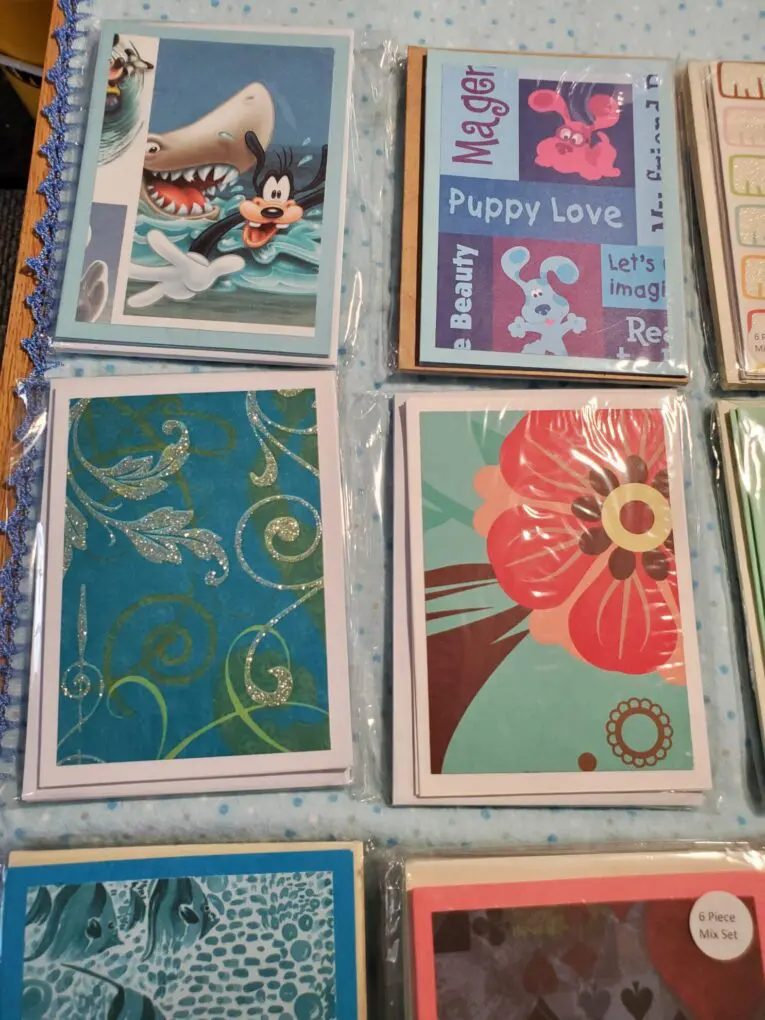 Assorted colorful greeting cards displayed together.