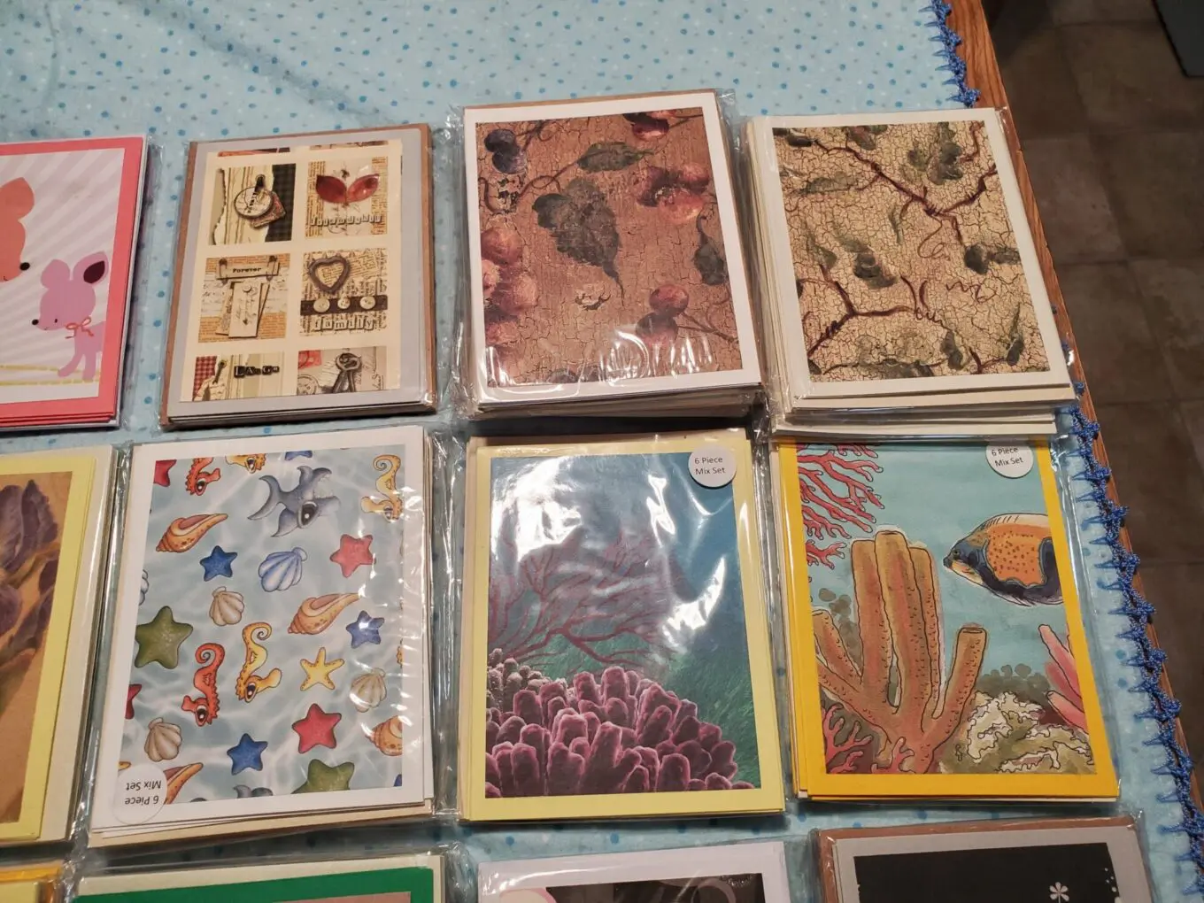 Assorted greeting cards with vibrant designs.