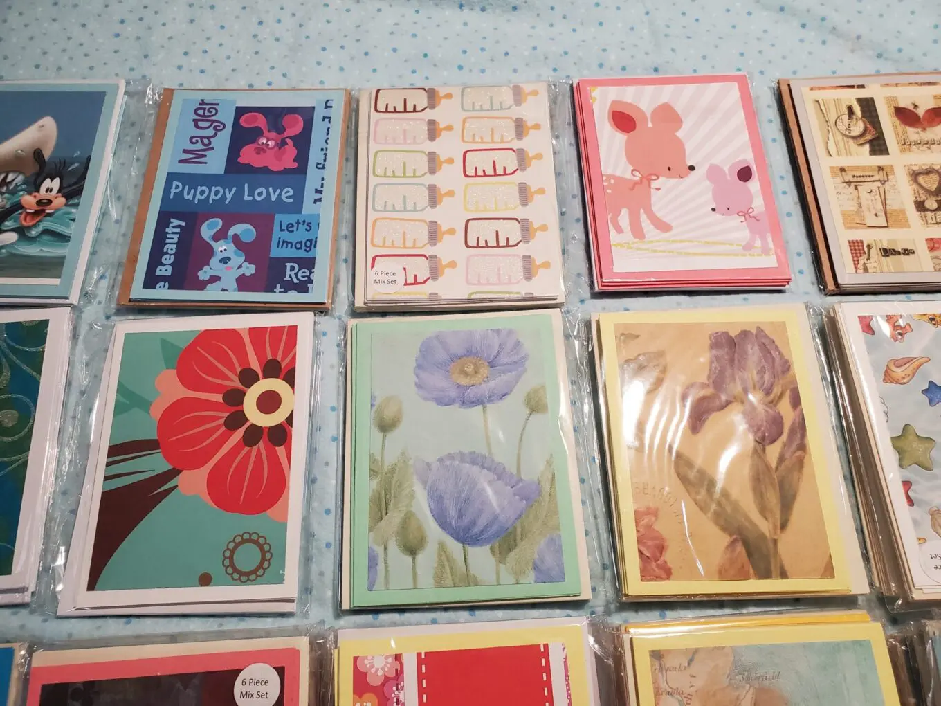 Colorful cards with various artistic designs.