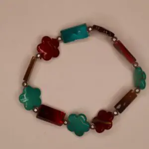 Colorful bracelet featuring flower and rectangular beads.