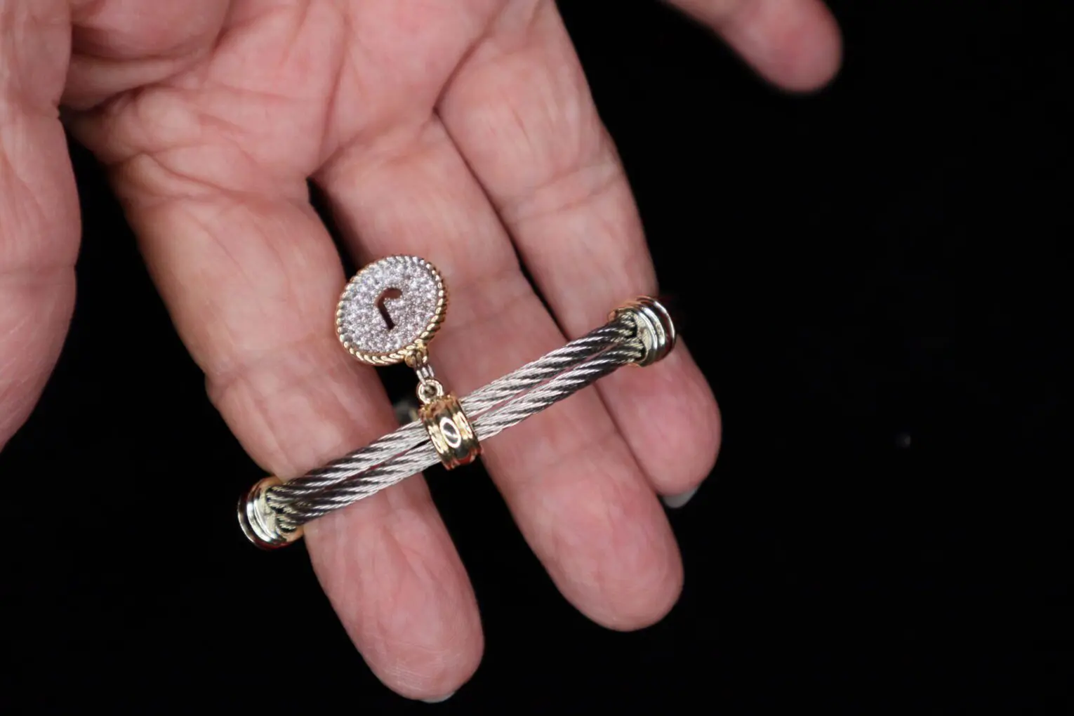 Elegant bracelet with sparkling charm detail.