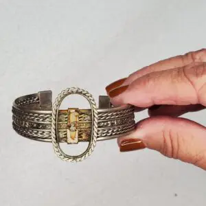 Vintage silver bracelet with intricate design.