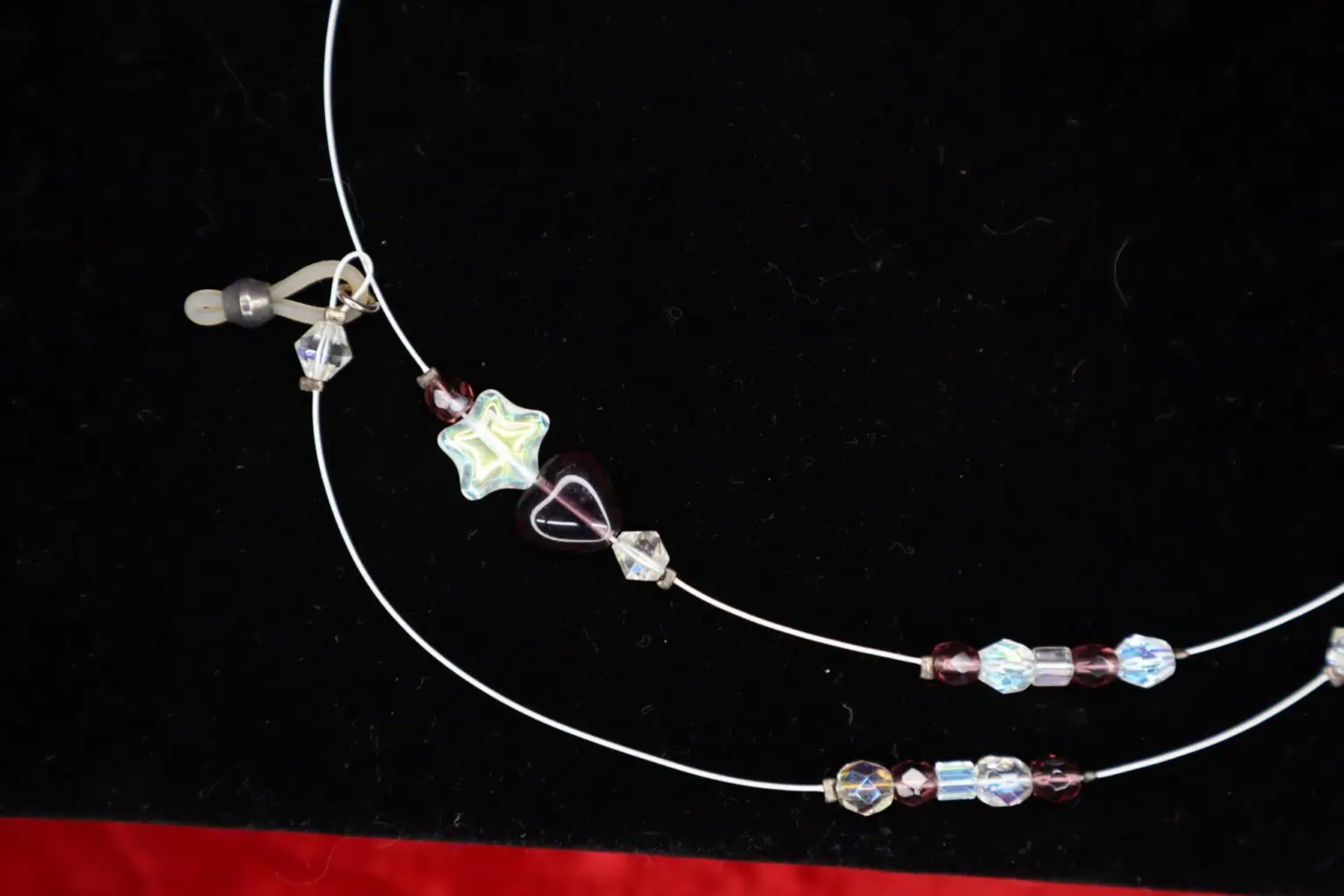 Colorful beaded necklace with star-shaped accents.