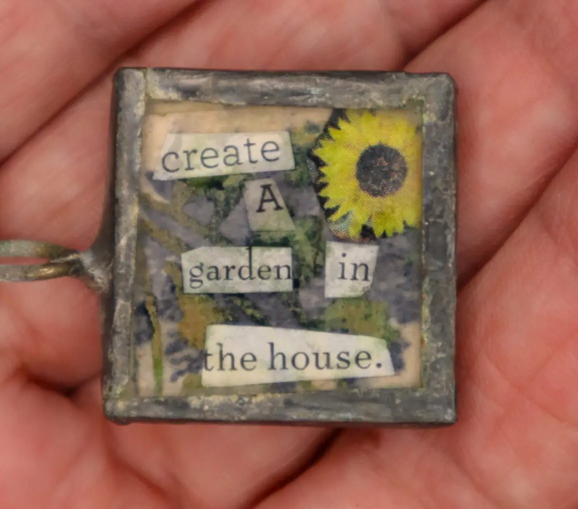 Handcrafted pendant with inspirational garden quote.