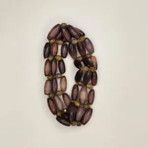Beaded necklace with purple and brown accents.