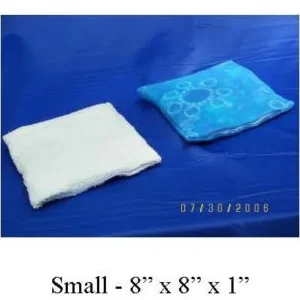 Small 8x8 inch gel and cloth ice packs on a blue surface.