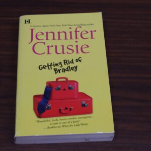 Book titled 'Getting Rid of Bradley' by Jennifer Crusie on a wooden surface.